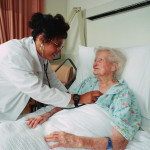 elderly-woman-in-hospital-bed